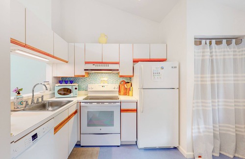 Brewster Apartment | Charming second-floor retreat with a full kitchen and balcony view