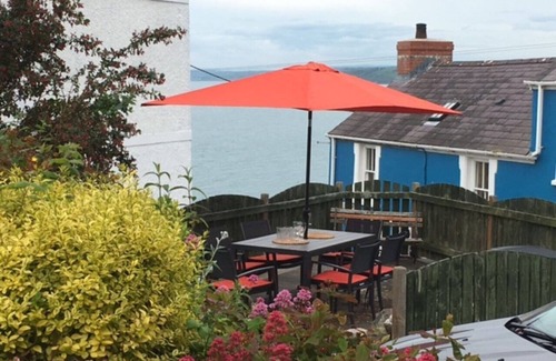 New Quay House | Charming semi-detached cottage in New Quay. Sea views from the windows. Family-friendly location