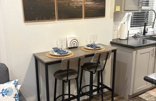 Conroe Cottage | Charming Tiny Home in Conroe with huge patio +grill & lots of green space.