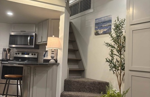 Conroe Cottage | Charming Tiny Home in Conroe with huge patio +grill & lots of green space.