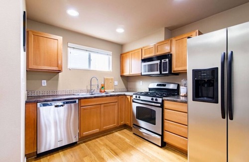 Greenwood House | Charming Townhome Walk to Food & Shops, EV Charger