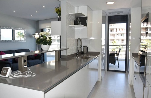 Els Arenals del Sol Apartment | Charming two bedroom apartment with sofa bed and sea views.