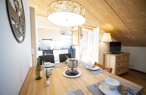 Engadin Scoul Apartment | Chasa Bagnera 174: modern 3 1/2 -room attic apartment right next to the Engadin Bad Scuol