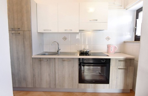 Basanija Apartment | Cheap apartment in Bašanija, two rooms, WiFi, air-conditioned, parking