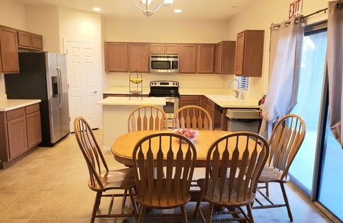 Laveen House | Cheerful Yellow 2-Bedroom Residential Home