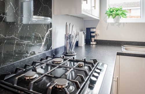 Blacon House | Chester 3 bedroom home close to city, TV in every bedroom, sleeps 5 by Restfully
