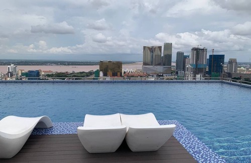 Phnom Penh City Centre Apartment | Chic 1-bedroom apartment in welcoming Phnom Penh with AC, WiFi