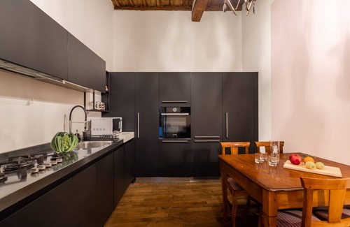 Rione VII Regola Apartment | Chic and Style in Historical Via Giulia