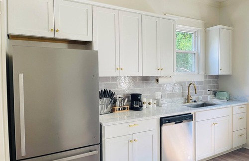 Crosstown House | Chic Crosstown Bungalow with large fenced backyard, Summer Special is on!