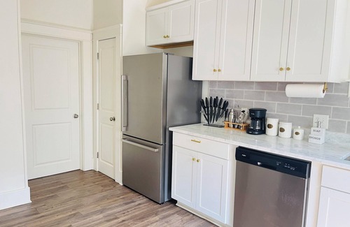 Crosstown House | Chic Crosstown Bungalow with large fenced backyard, Summer Special is on!