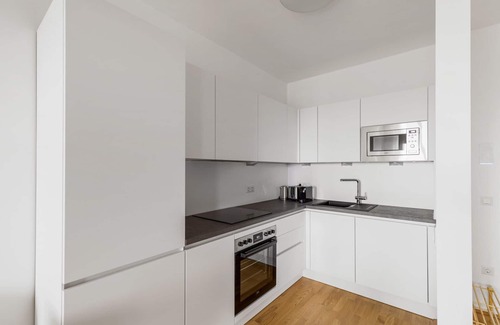 Erdberg Apartment | Chic Landstraße 1BR w/Pool & Playground, nr Hyblerpark, by Blueground