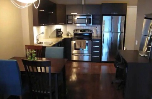International District Condo | Chic Luxury Downtown Condo with Pool & Garage !n