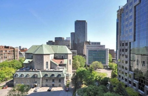 International District Condo | Chic Luxury Downtown Condo with Pool & Garage !n