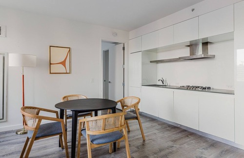 Central New York City Apartment | Chic Midtown 2BR w/Gym, W/D & A/C, near Rock Ctr, by Blueground