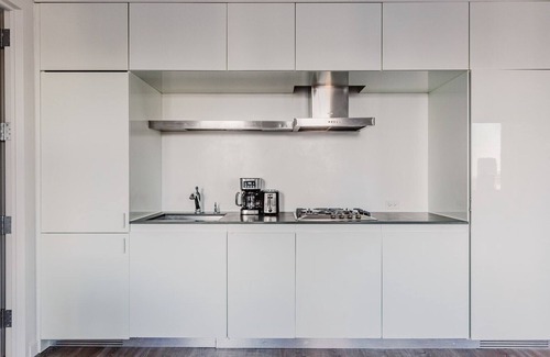 Central New York City Apartment | Chic Midtown 2BR w/Gym, W/D & A/C, near Rock Ctr, by Blueground