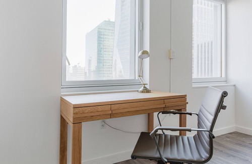 Central New York City Apartment | Chic Midtown 2BR w/Gym, W/D & A/C, near Rock Ctr, by Blueground