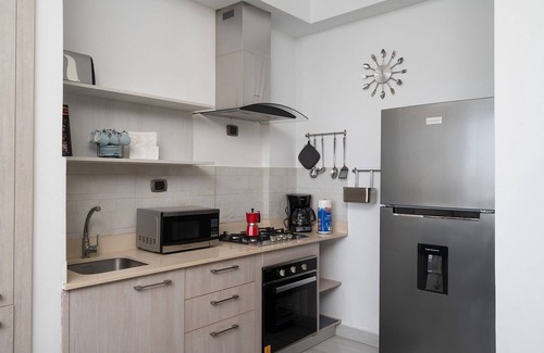 Downtown Santo Domingo Condo | City Center, Amazing Endless View w/Pool YellowKey