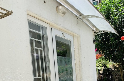 Islands District House | City Oasis Guesthouse