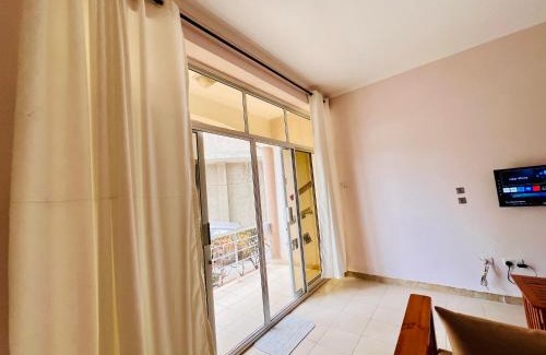 Sinza Apartment | City Private living room & kitchen