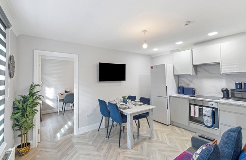 Bow West House | City Sophistication: Chic 3-BR for Modern Living