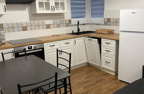 Varosfold House | CityLand near Mercedes Benz
