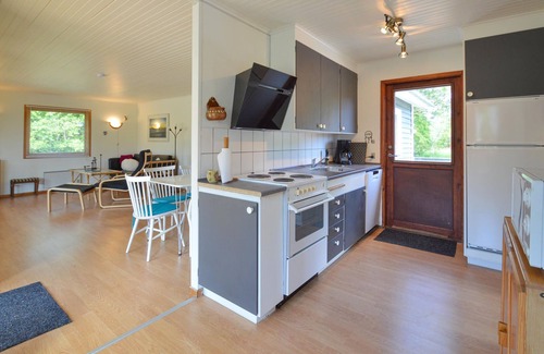 Næsby Strand House | Classic, Danish cottage near the water.