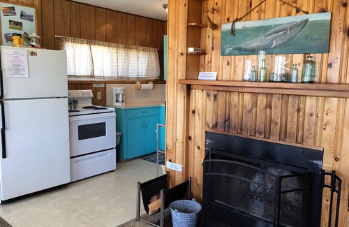 Edgewater Shores Cottage | Classic Honeymoon Beach Cottage. Private, Romantic, Oceanfront. Pet friendly.