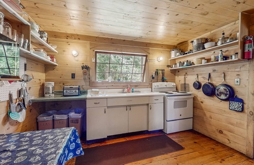 Charlotte Cottage | Classic lakefront cabin with screened-in porch & great views - dogs welcome