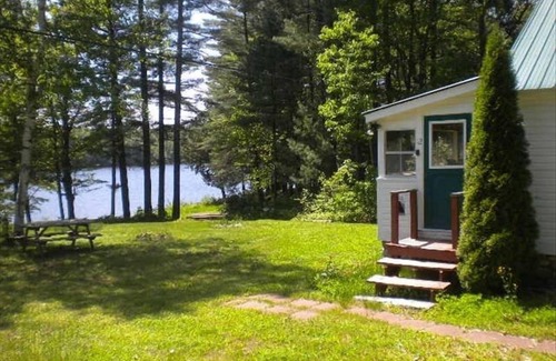 Oxford Cabin | Classic Maine Lakefront Cabin, Porch and Canoe