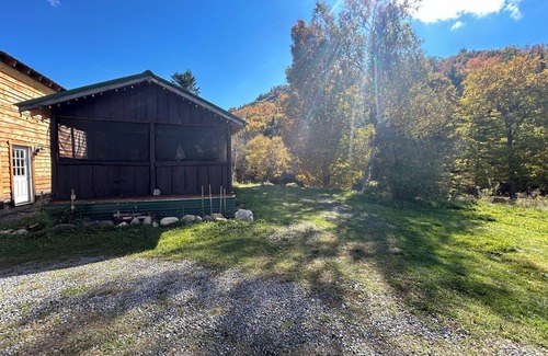 Columbia Cabin | Classic original cedar log cabins set on Simms Stream in the North East Kingdom.