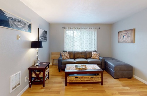 Sumner House | Classic, sports themed cottage with porch & great yard - near downtown
