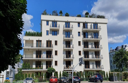 Warsaw Apartment | Classical Warszaw Apartment inside building with garden on the roof