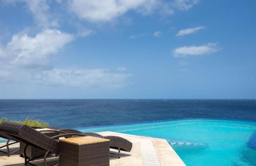 Sabana Westpunt Villa | Cliff Villa - Award Winning Luxury Retreat