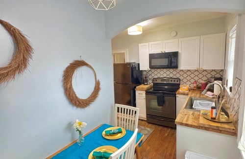 Historic Uptown House | Close to all with a King-bed! Bikes included