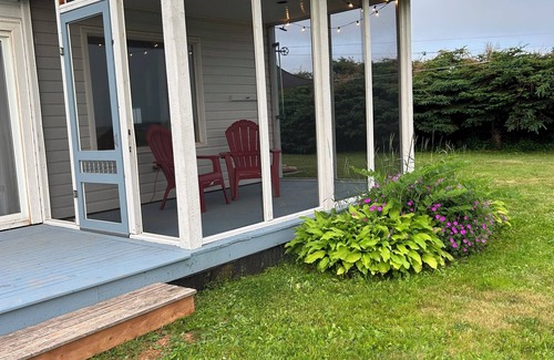 Souris Cottage | Close to Beach and Town of Souris. Quaint cottage with lovely log cabin feel.