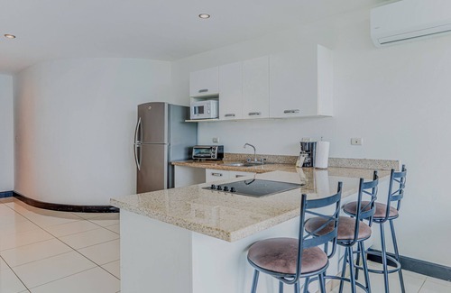Puntarenas Condo | Coastal condo with stunning sea views, rain shower & private balcony escape