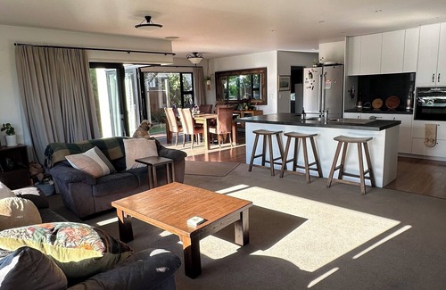 Papamoa Beach House | Coastal family home, 5 minutes walk to beach, hot tub, fully accessible