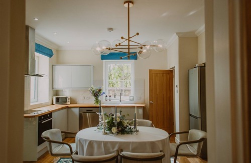 Stranraer Cottage | Coastal Magnificence: Saltwater Chronicles with private sea view deck.