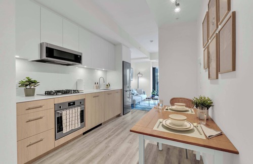 Eau Claire Apartment | Coastal Winds DT | Gym | River Walk