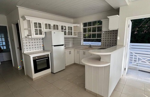 Mullins Apartment | Coconut Grove Retreat: 2 Bedroom Apartment with view of Pool and Mullins Beach