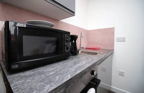Penylan Apartment | Cohost Partners | Smart TV | 5 Min City | Parking