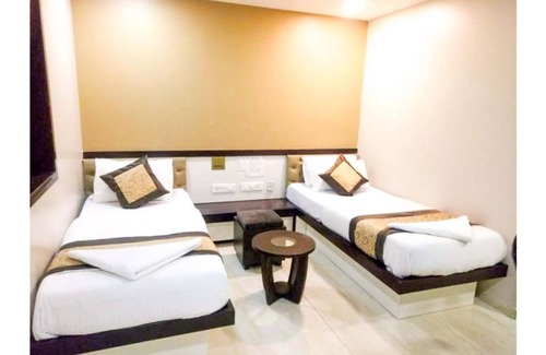 Wellington Pier Hotel | Colaba Suites - Near Taj Hotel