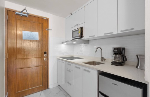 Puerta de Tierra Apartment | Colonial Old San Juan | Waterfront Studio | Terrace with Coastal Vista