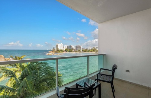 Puerta de Tierra Apartment | Colonial Old San Juan | Waterfront Studio | Terrace with Coastal Vista