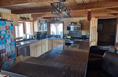 Lewis Cabin | Colorado cabin featuring a EV car charging station