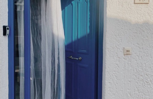 Malia House | Colourful Cottage in the old village, close to everything & 15min walk to beach