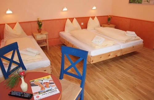 Sirnitz-Sonnseite House | Comfort Vierbettzimmer, Halbpension - Jufa Hotel Hochrindl