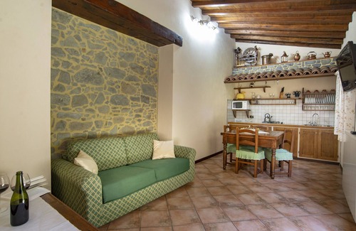 Pieve Fosciana Cottage | Comfortable 1 bedroomed apartment, pool, restaurant in village on eco-farm.