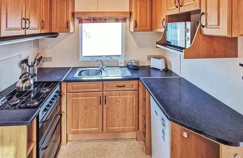 Llanllwchaiarn House | Comfortable caravan with one double and two twin.