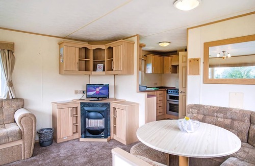 Llanllwchaiarn House | Comfortable caravan with one double and two twin.